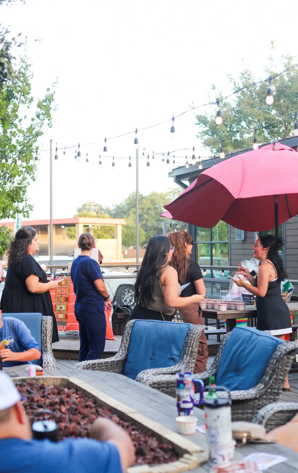 Guests getting to know each other at an outdoor evening gathering